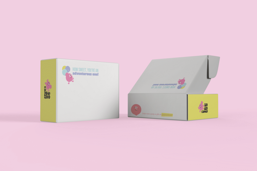 Go Go Candy branded geschenkdozen met speelse snoepmannetjes, gele zijkanten en de tekst 'How sweet, you're an adventurous on
