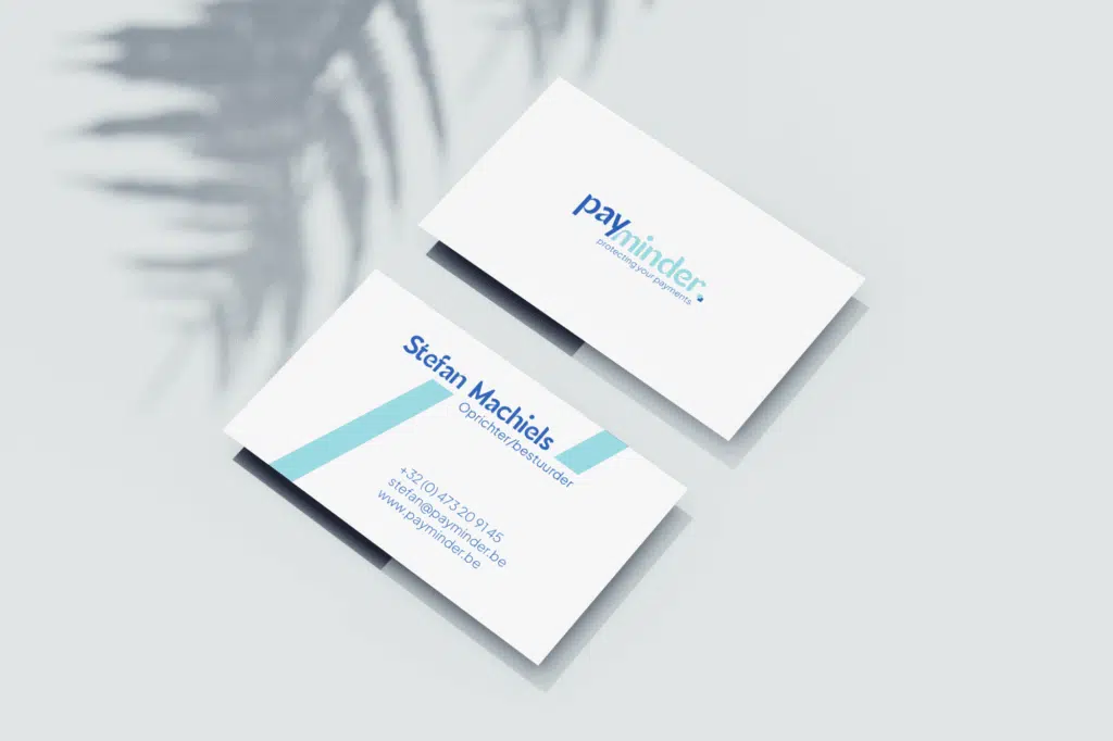 Payminder visitekaartjes mockup met logo, naam Stefan Machiels en contactgegevens in blauwe huisstijl