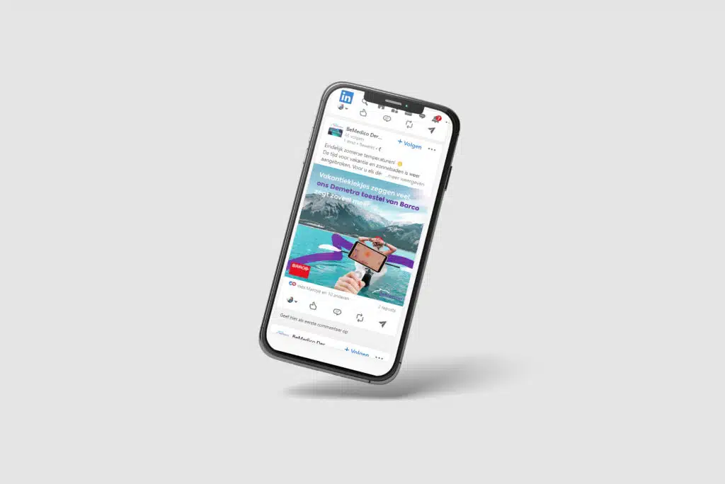Smartphone met een LinkedIn post van BeMedico, waarin het Demetra apparaat van Barco wordt gepromoot.
